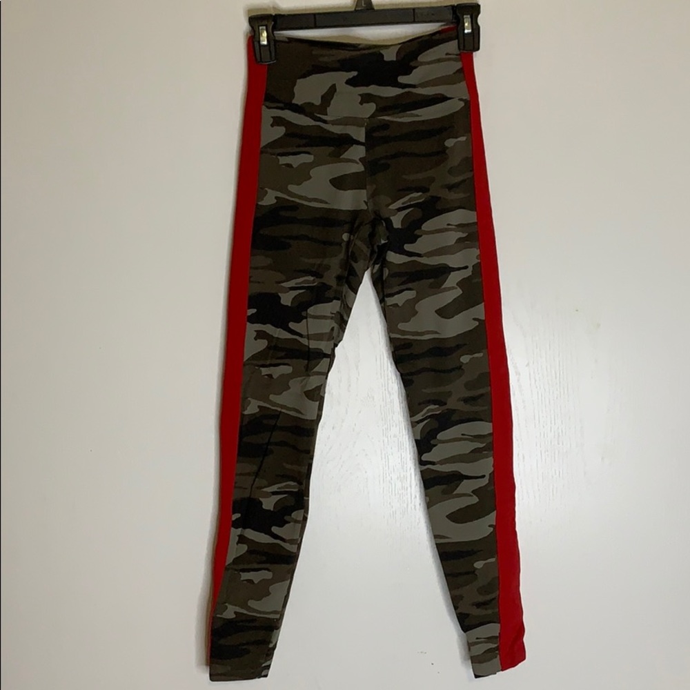 Green camel print leggings with red stripes